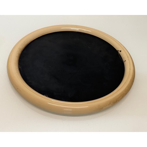 49 - Mid century furniture, a circular framed wall mirror.

This lot is available for in-house shipping