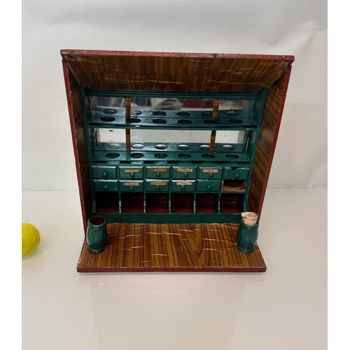 56 - Toys and games, a dolls house type shop counter, 37 cm wide x 41 cm tall x 23 cm deep.

This lot is ... 