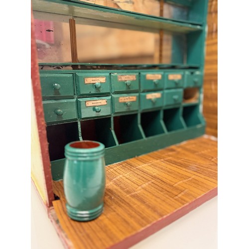 56 - Toys and games, a dolls house type shop counter, 37 cm wide x 41 cm tall x 23 cm deep.

This lot is ... 