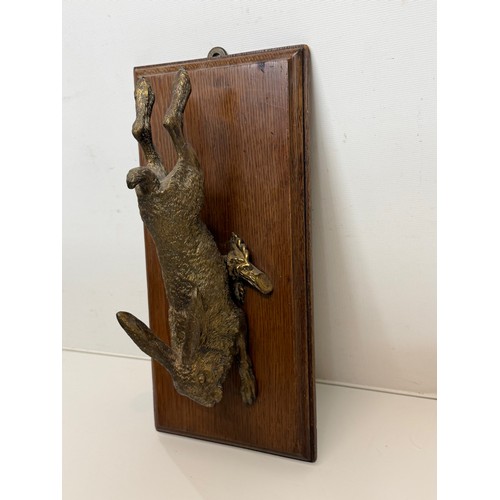 7 - Austrian school C19th century bronze, a cast and sprung paper clip in the form of a leaping hare, de... 