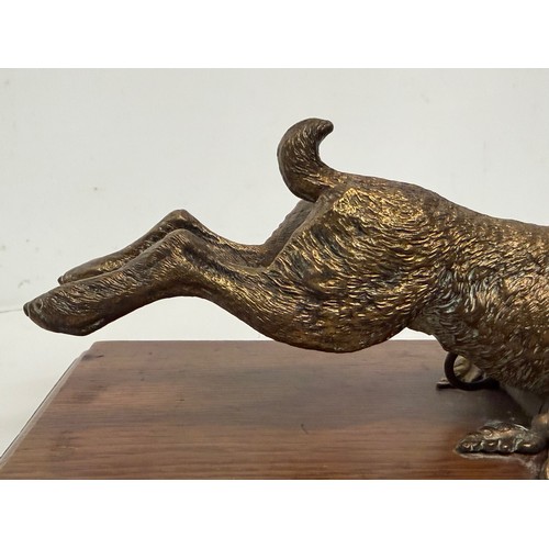 7 - Austrian school C19th century bronze, a cast and sprung paper clip in the form of a leaping hare, de... 