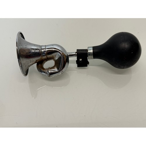 231 - Automobilia, a cycle or small motorcycle bulb type horn.

This lot is available for in-house shippin... 