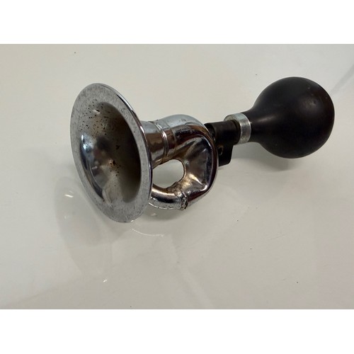 231 - Automobilia, a cycle or small motorcycle bulb type horn.

This lot is available for in-house shippin... 