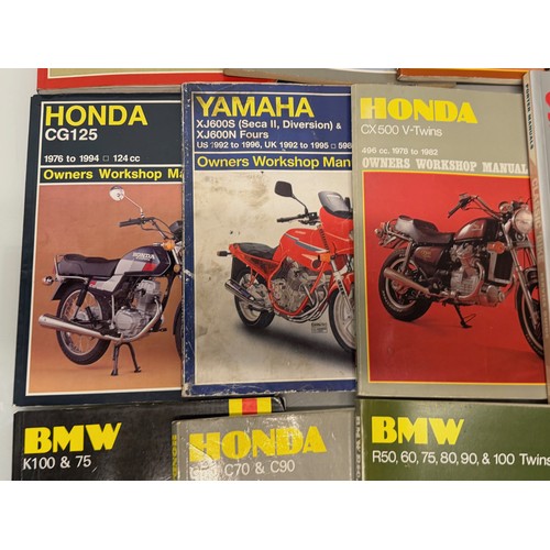 234 - Automobilia, workshop equipment, a collection of motorcycle repair manuals, Haynes etc, 47 in all.
