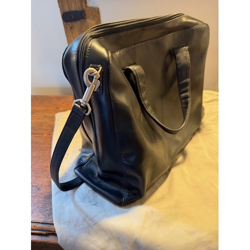 202 - Vintge fashions, accessories, a leather Radley handbag, with origional storage bag.

This lot is ava... 