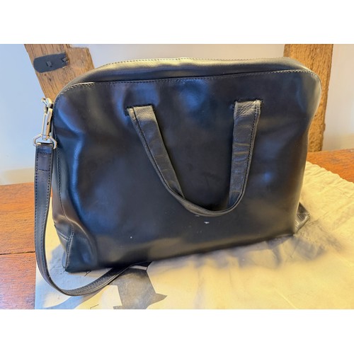 202 - Vintge fashions, accessories, a leather Radley handbag, with origional storage bag.

This lot is ava... 