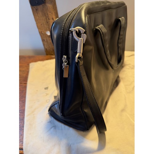 202 - Vintge fashions, accessories, a leather Radley handbag, with origional storage bag.

This lot is ava... 