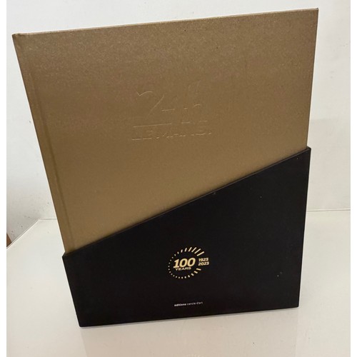 238 - Automobilia, motor racing, A book celerating one hundred years of the 24 hour motor race at Le Mans.... 