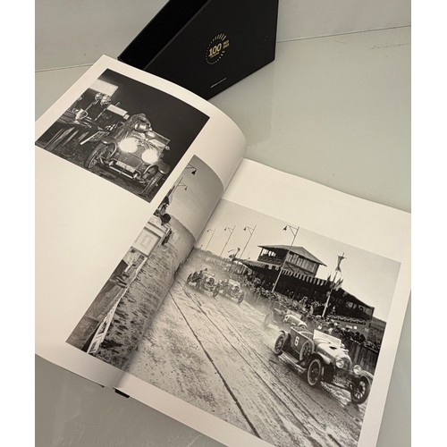 238 - Automobilia, motor racing, A book celerating one hundred years of the 24 hour motor race at Le Mans.... 