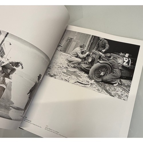 238 - Automobilia, motor racing, A book celerating one hundred years of the 24 hour motor race at Le Mans.... 