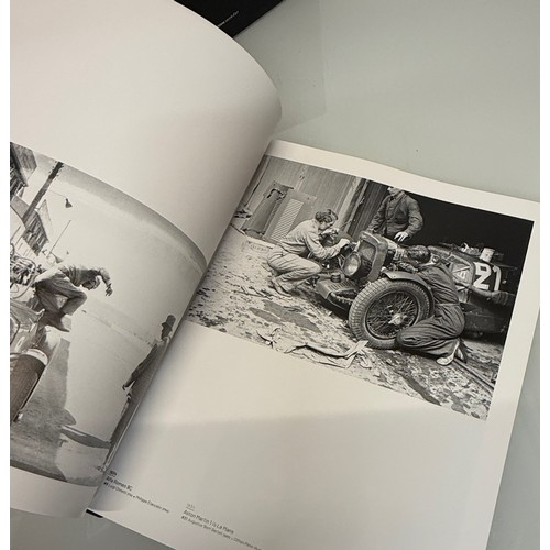238 - Automobilia, motor racing, A book celerating one hundred years of the 24 hour motor race at Le Mans.... 