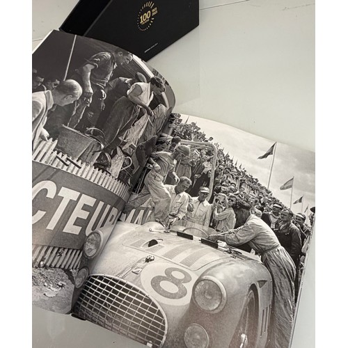 238 - Automobilia, motor racing, A book celerating one hundred years of the 24 hour motor race at Le Mans.... 