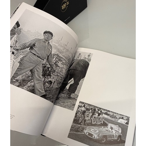 238 - Automobilia, motor racing, A book celerating one hundred years of the 24 hour motor race at Le Mans.... 
