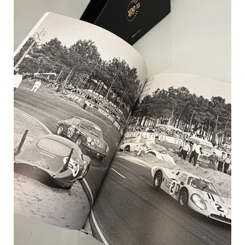 238 - Automobilia, motor racing, A book celerating one hundred years of the 24 hour motor race at Le Mans.... 