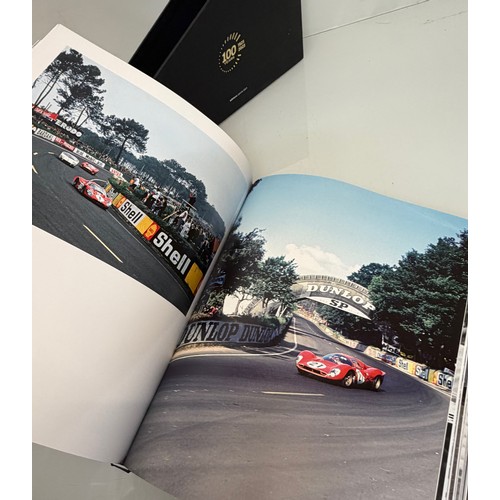 238 - Automobilia, motor racing, A book celerating one hundred years of the 24 hour motor race at Le Mans.... 