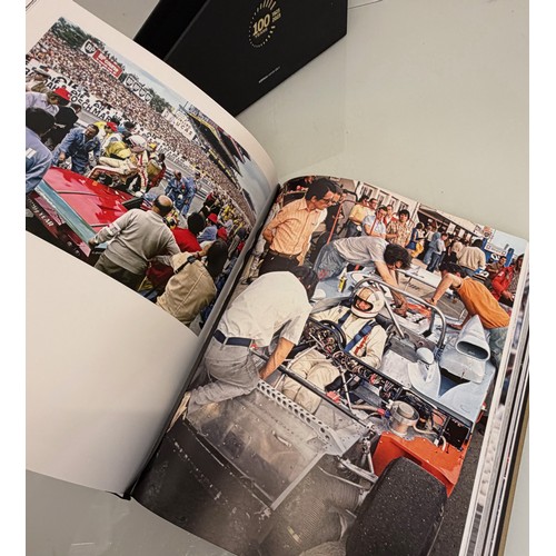 238 - Automobilia, motor racing, A book celerating one hundred years of the 24 hour motor race at Le Mans.... 