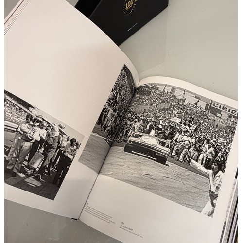 238 - Automobilia, motor racing, A book celerating one hundred years of the 24 hour motor race at Le Mans.... 