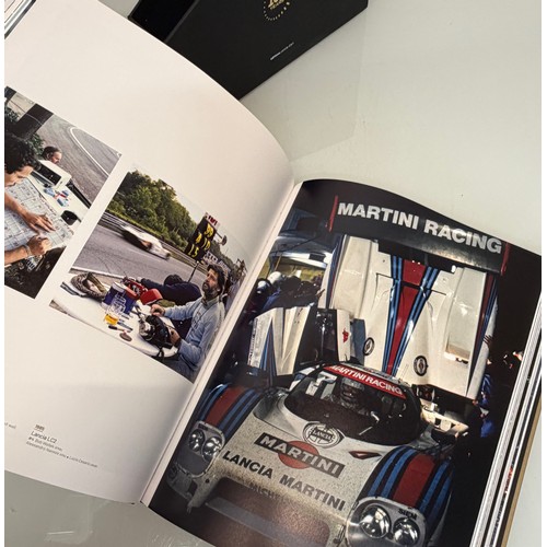 238 - Automobilia, motor racing, A book celerating one hundred years of the 24 hour motor race at Le Mans.... 