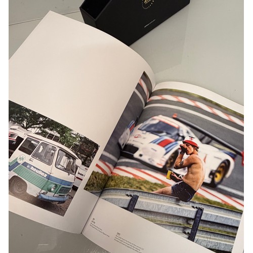238 - Automobilia, motor racing, A book celerating one hundred years of the 24 hour motor race at Le Mans.... 