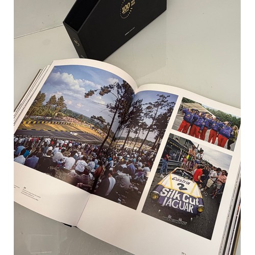 238 - Automobilia, motor racing, A book celerating one hundred years of the 24 hour motor race at Le Mans.... 