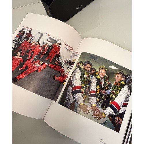 238 - Automobilia, motor racing, A book celerating one hundred years of the 24 hour motor race at Le Mans.... 
