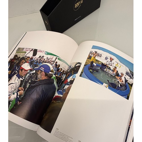 238 - Automobilia, motor racing, A book celerating one hundred years of the 24 hour motor race at Le Mans.... 