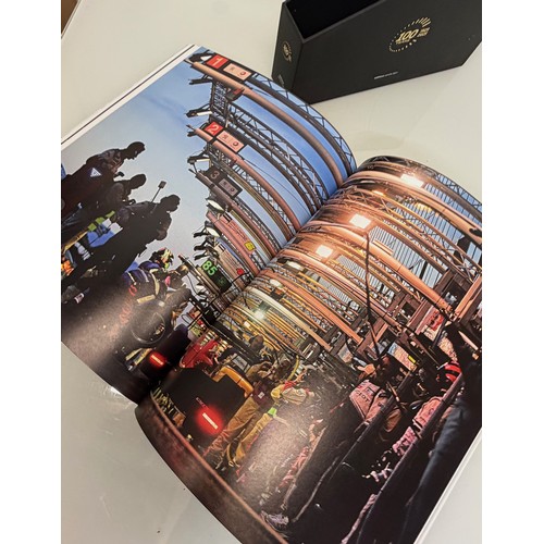 238 - Automobilia, motor racing, A book celerating one hundred years of the 24 hour motor race at Le Mans.... 