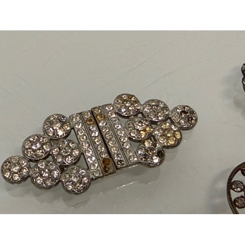 383 - A collection of buckles, from Georgian to Art Deco.

This lot is available for in-house shipping.