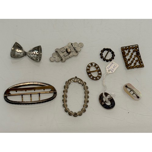 383 - A collection of buckles, from Georgian to Art Deco.

This lot is available for in-house shipping.