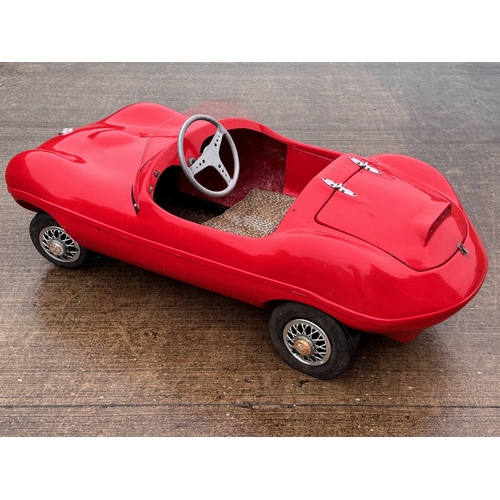 229 - Automobilia, racing car, toy car,  pedal car, a Jaguar XKSS ride in petrol engined Cheetah Cub from ... 