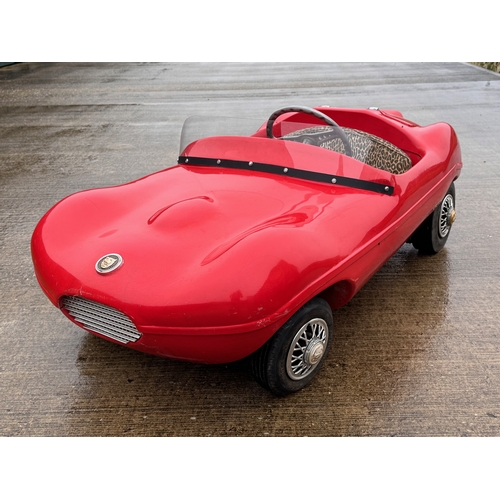 229 - Automobilia, racing car, toy car,  pedal car, a Jaguar XKSS ride in petrol engined Cheetah Cub from ... 