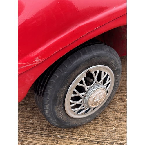 229 - Automobilia, racing car, toy car,  pedal car, a Jaguar XKSS ride in petrol engined Cheetah Cub from ... 