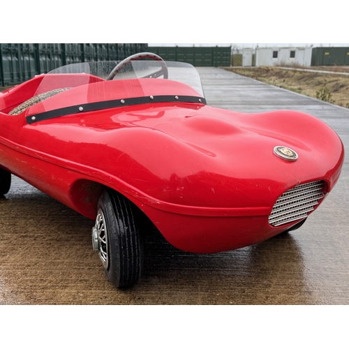 229 - Automobilia, racing car, toy car,  pedal car, a Jaguar XKSS ride in petrol engined Cheetah Cub from ... 