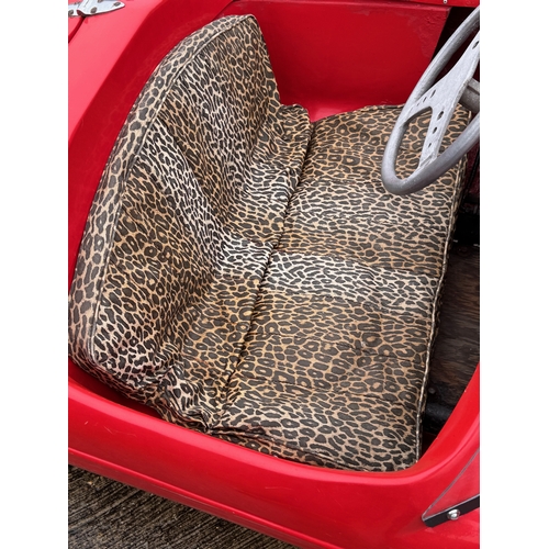 229 - Automobilia, racing car, toy car,  pedal car, a Jaguar XKSS ride in petrol engined Cheetah Cub from ... 