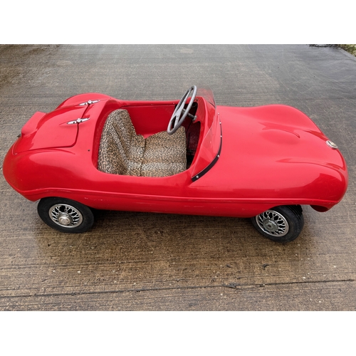 229 - Automobilia, racing car, toy car,  pedal car, a Jaguar XKSS ride in petrol engined Cheetah Cub from ... 