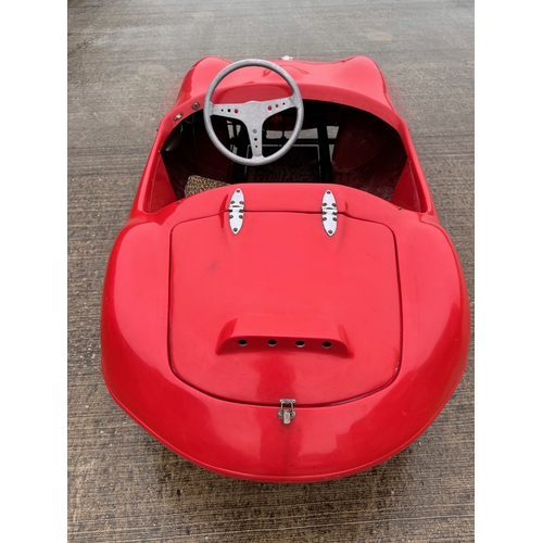 229 - Automobilia, racing car, toy car,  pedal car, a Jaguar XKSS ride in petrol engined Cheetah Cub from ... 