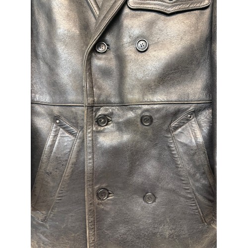 181 - Automobilia, Vintage clothing, a leather Police Motorcyclists coat.

This lot is available for in-ho... 
