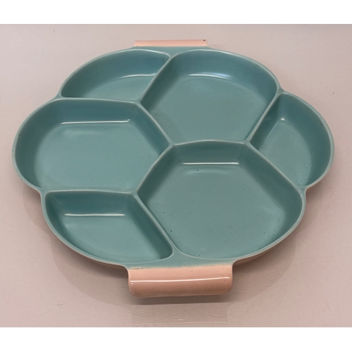485 - Poole Pottery, mid century ceramics, a Twintone serving platter, 34 cm wide.

This lot is available ... 