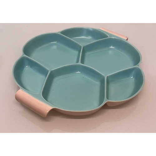 485 - Poole Pottery, mid century ceramics, a Twintone serving platter, 34 cm wide.

This lot is available ... 