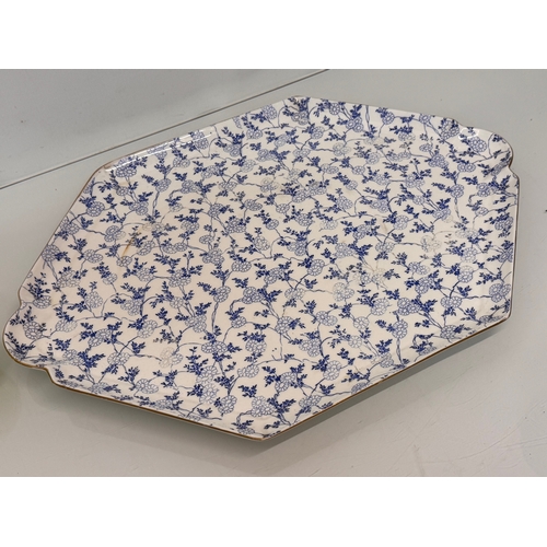 488 - English C20th century ceramics, a large meat platter with a delicate floral design and gilded rim. 4... 