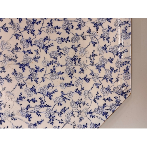 488 - English C20th century ceramics, a large meat platter with a delicate floral design and gilded rim. 4... 