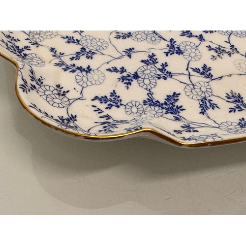 488 - English C20th century ceramics, a large meat platter with a delicate floral design and gilded rim. 4... 