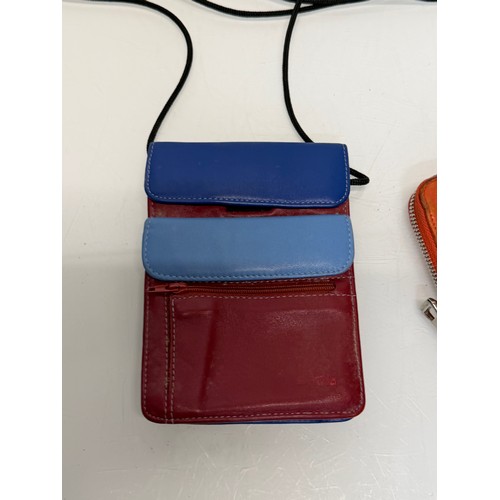 199 - Ladies fashion accessories, a Tula brand purse and a Longchamp purse which is large enough to carry ... 