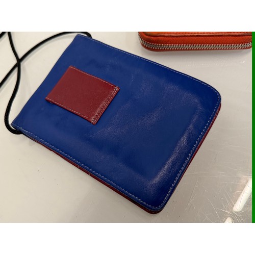 199 - Ladies fashion accessories, a Tula brand purse and a Longchamp purse which is large enough to carry ... 