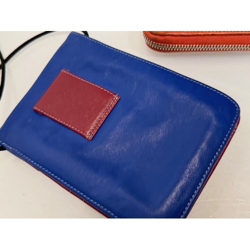 199 - Ladies fashion accessories, a Tula brand purse and a Longchamp purse which is large enough to carry ... 