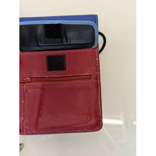 199 - Ladies fashion accessories, a Tula brand purse and a Longchamp purse which is large enough to carry ... 