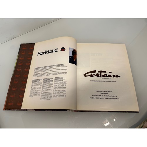 204 - Vintage Fashions, a manufactuers catalogue for 1980 gents clothing, with material samples inside.

T... 