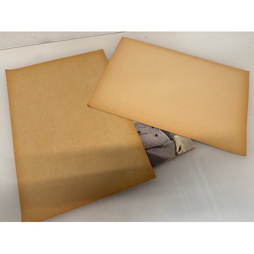 203 - Vintage Fashions, a manufactuers posters on board for 1960 ladies clothing, with a 1973 brochure.

T... 