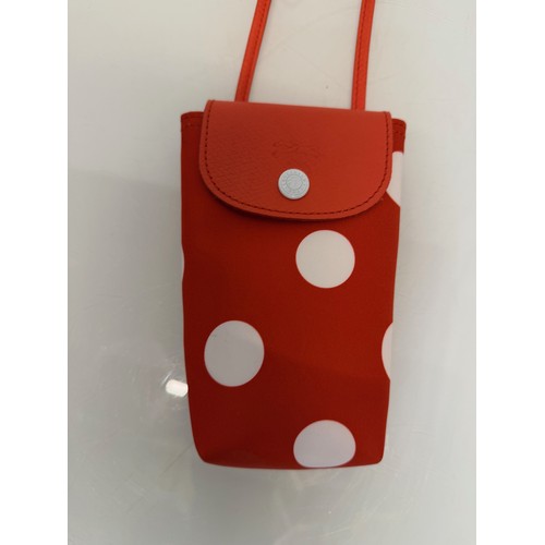 Fashion accessories, a ladies Longchamp phone bag with a striking ...