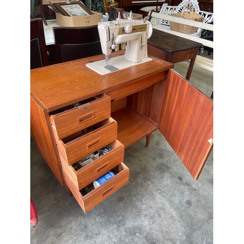 51 - Singer Sewing Machine in Teak Cabinet